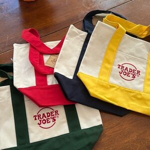 New w tags Trader Joe’s mini bags - red, green, blue and yellow. So cute.